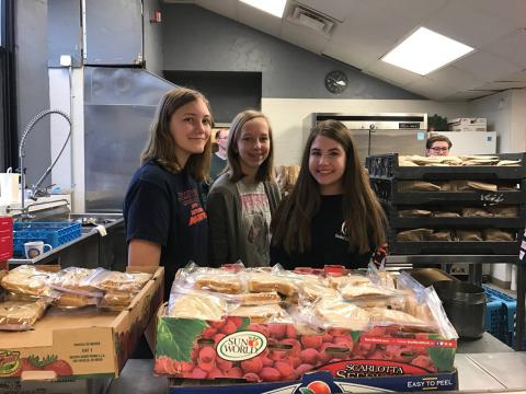 Our 8th grade students transported 400 lunches and 180 hats and gloves to the NOAH Project's Community Center for the homeless in Detroit. The students greeted and distributed lunches and beverages with kindness and compassion. Our 8th grade students transported 400 lunches and 180 hats and gloves to the NOAH Project's Community Center for the homeless in Detroit. The students greeted and distributed lunches and beverages with kindness and compassion.