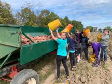 Our 8th grade students transported 400 lunches and 180 hats and gloves to the NOAH Project's Community Center for the homeless in Detroit. The students greeted and distributed lunches and beverages with kindness and compassion.