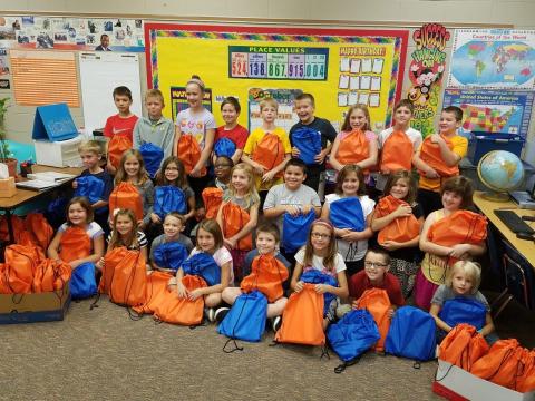 St. Matthew families donated school supplies for needy children. Third and fourth grade students assembled 212 school kits for Lutheran World Relief to distrubute. 
